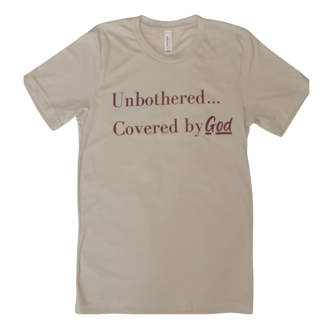 Our Unbothered...Covered by God tee is a reminder to continue making moves even when fear is present and knowing God is leading and covering us through it all.  We are One LOVE through Christ!